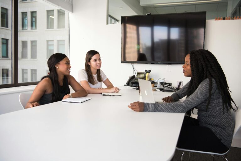 Marketing workers discussing measures of true success.