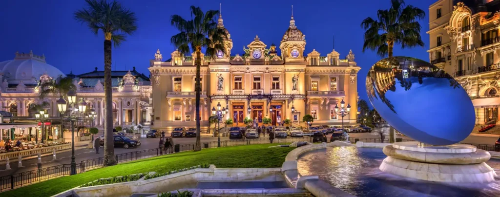 image: night view of monte carlo casino in monaco